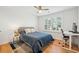 Bedroom featuring a cozy bed, a desk for study, and natural light from a large window at 716 Muirhead Rd, Mount Pleasant, SC 29464