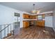 Spacious kitchen with wood cabinets, stainless steel oven and modern flooring at 7639 Northhaven Dr, North Charleston, SC 29420