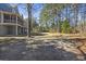 Spacious backyard with mature trees and plenty of room for outdoor activities at 7938 Pelican Bay Dr, Awendaw, SC 29429