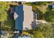 Aerial view of a home with mature trees and a well manicured lawn at 9656 Pebble Creek Blvd, Summerville, SC 29485