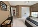 Neutral bedroom with a large closet, ceiling fan, and playful decor at 9656 Pebble Creek Blvd, Summerville, SC 29485