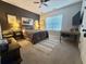 Cozy bedroom featuring a comfortable bed, neutral colors, and ample natural light at 9656 Pebble Creek Blvd, Summerville, SC 29485