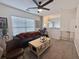 Cozy living room with a large window, comfortable sofa, and stylish decor. The room is well-lit at 9656 Pebble Creek Blvd, Summerville, SC 29485