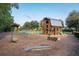Neighborhood playground featuring a two-story barn-style playhouse, swings and other activities at 972 Carnes Crossing Blvd, Summerville, SC 29486