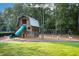 Neighborhood playground featuring a fun two-story playhouse with a slide, and swing set area at 972 Carnes Crossing Blvd, Summerville, SC 29486