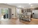 Stylish kitchen with stainless steel appliances, granite countertops, and an island with seating at 103 Cardinal Flower Ct, Moncks Corner, SC 29461