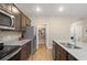 Kitchen featuring stainless steel appliances, granite countertops, and a pantry at 103 Cardinal Flower Ct, Moncks Corner, SC 29461