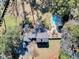 The grounds feature a sparkling pool, manicured landscaping, and an inviting patio area at 108 Tea Farm Rd, Summerville, SC 29483