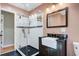 Bathroom featuring a sleek glass shower and a stylish vanity with a farmhouse sink at 108 Tea Farm Rd, Summerville, SC 29483
