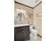 Neutral toned half bathroom with a single sink vanity and shiplap walls at 108 Tea Farm Rd, Summerville, SC 29483