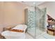 Modern bathroom featuring a soaking tub and a glass-enclosed shower with decorative tile accents at 108 Tea Farm Rd, Summerville, SC 29483