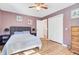 Comfortable bedroom with hardwood floors, a ceiling fan, and a closet for ample storage at 108 Tea Farm Rd, Summerville, SC 29483