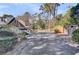 Long driveway and a shed adding storage and functionality to the property at 108 Tea Farm Rd, Summerville, SC 29483