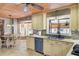 Bright kitchen with stainless steel appliances, tile backsplash, and cream colored cabinets at 108 Tea Farm Rd, Summerville, SC 29483