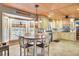 Well-lit kitchen with breakfast nook, wood ceilings, ample countertops, and modern appliances at 108 Tea Farm Rd, Summerville, SC 29483