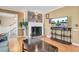 Inviting living room features a brick fireplace, hardwood floors, and a flatscreen television on a console table at 108 Tea Farm Rd, Summerville, SC 29483