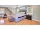 Relaxing main bedroom with large windows and a king-size bed with a decorative ceiling fan at 108 Tea Farm Rd, Summerville, SC 29483