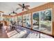 Open patio with tiled floor, ceiling fans, and view to landscaped backyard at 108 Tea Farm Rd, Summerville, SC 29483