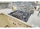 Close up of the stovetop with modern stainless steel details and marble countertops at 108 Tea Farm Rd, Summerville, SC 29483