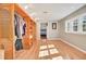 Spacious walk-in closet with custom wood shelving and storage, filled with natural light at 108 Tea Farm Rd, Summerville, SC 29483