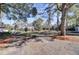 Expansive lawn showcasing the property's mature trees and manicured grounds at 108 Tea Farm Rd, Summerville, SC 29483