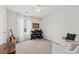 Bedroom featuring neutral walls and carpet, white trim, and a window with curtains at 12 Palmetto Park Dr, Charleston, SC 29407