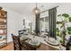 Elegant dining room with a wooden table set for a meal and stylish decor at 12 Palmetto Park Dr, Charleston, SC 29407