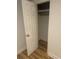 Walk-in closet featuring modern laminate flooring and a new coat of paint at 1202 Forty-One Rd, Saint Stephen, SC 29479