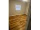 Bright bedroom featuring new laminate flooring and a window at 1202 Forty-One Rd, Saint Stephen, SC 29479