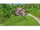 Sprawling green lawn and landscaping compliment this charming two story brick home at 1208 Red Buckeye Ct, Moncks Corner, SC 29461