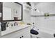 Bathroom with subway tile surround, updated fixtures, and neutral paint at 1208 Red Buckeye Ct, Moncks Corner, SC 29461