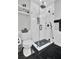Modern bathroom features a walk-in shower with black fixtures and a sleek vanity at 1208 Red Buckeye Ct, Moncks Corner, SC 29461
