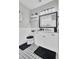 Elegant bathroom features a white vanity, modern lighting, and patterned tile floor at 1208 Red Buckeye Ct, Moncks Corner, SC 29461
