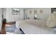 Well-lit bedroom featuring hardwood floors, neutral colors, and built-in storage at 1208 Red Buckeye Ct, Moncks Corner, SC 29461