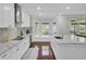 Bright kitchen featuring stainless steel appliances, a center island, and a breakfast nook with natural light at 1208 Red Buckeye Ct, Moncks Corner, SC 29461