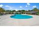 Beautifully designed community pool with ample deck space and cabanas at 1208 Red Buckeye Ct, Moncks Corner, SC 29461