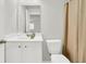 Bathroom featuring a single sink vanity, tile floors, and a shower with a tan curtain at 121 Loon Dr, Summerville, SC 29483