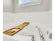 Bright bathroom featuring a soaking tub with a wooden bath caddy and chrome fixtures at 121 Loon Dr, Summerville, SC 29483