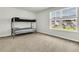 Bedroom featuring carpet flooring, a bunk bed, and a window with neighborhood views at 121 Loon Dr, Summerville, SC 29483