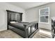 Bedroom with carpet flooring, a window, and a black bedroom set at 121 Loon Dr, Summerville, SC 29483