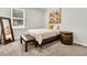 Cozy bedroom featuring carpet flooring, a queen-sized bed, and a small window at 121 Loon Dr, Summerville, SC 29483