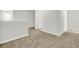 Neutral landing features light gray walls, carpet, and white trim at 121 Loon Dr, Summerville, SC 29483