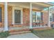 Charming front porch with rocking chairs, perfect for enjoying quiet moments outdoors at 1247 Oakcrest Dr, Charleston, SC 29412