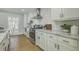 Modern kitchen features sleek stainless steel appliances, stylish countertops, and ample cabinet space at 1247 Oakcrest Dr, Charleston, SC 29412