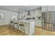 Spacious kitchen features a central island, stainless steel appliances, and white cabinetry at 1247 Oakcrest Dr, Charleston, SC 29412