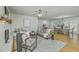 Inviting living room with fireplace, comfortable seating, and open flow to the dining area at 1247 Oakcrest Dr, Charleston, SC 29412