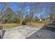 Spacious backyard with a concrete patio area, perfect for outdoor entertaining at 127 Ridge Rd, Summerville, SC 29485