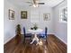 Charming dining area featuring a round table, two blue chairs, and bright, natural light at 127 Ridge Rd, Summerville, SC 29485