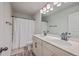 Bathroom with a double sink, and shower with curtain at 132 Mcclellan Way, Summerville, SC 29483