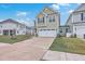 Charming two-story home with a well-maintained lawn, featuring an attached garage and inviting curb appeal at 132 Mcclellan Way, Summerville, SC 29483